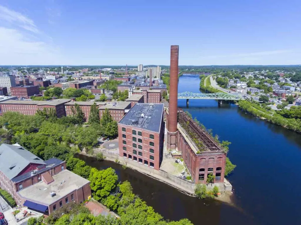 Lowell historic downtown, Marrimack River and Mills aerial view in Lowell, Massachusetts, USA.