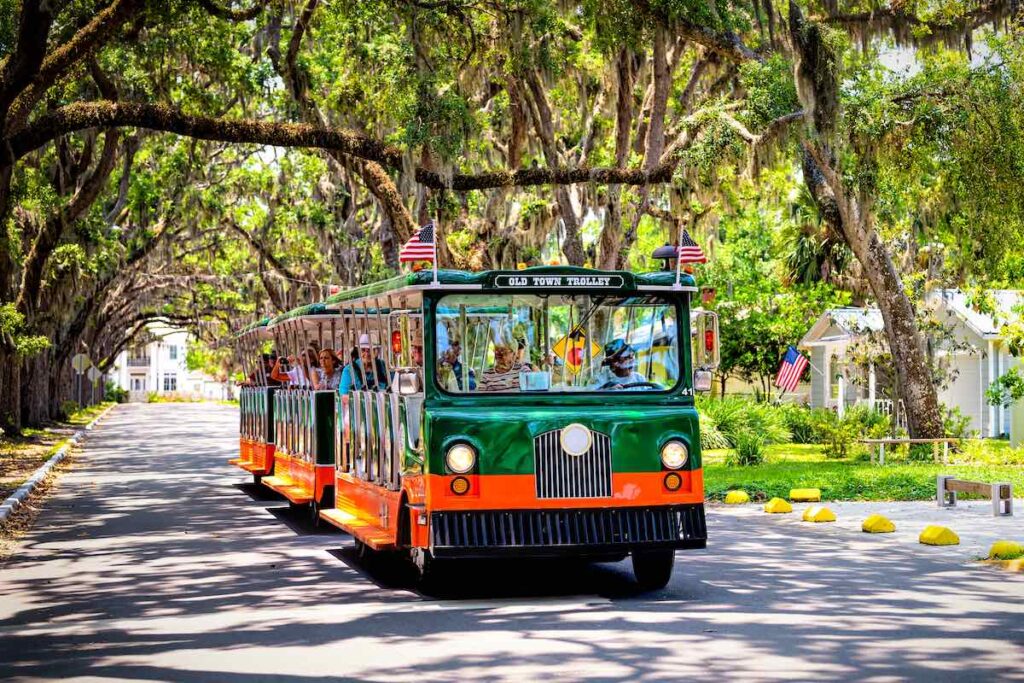 People riding on old town trolley