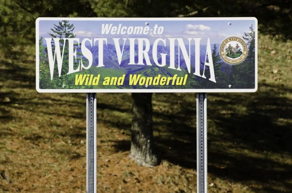 A sign welcomes viewers to West Virginia, where you can find the best camping in West Virginia.