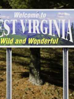 A sign welcomes viewers to West Virginia, where you can find the best camping in West Virginia.