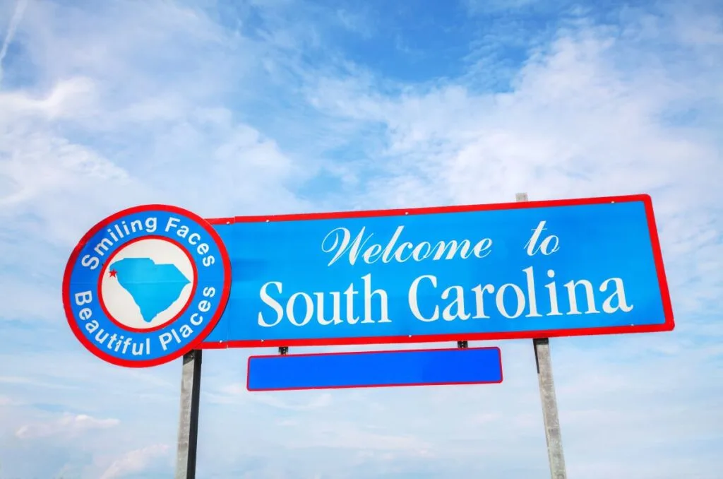 Welcome to South Carolina sign on the border of the state, where you can start to find the best campgrounds in South Carolina.
