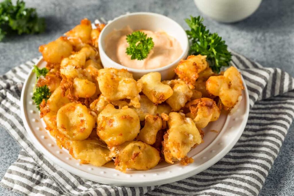 A plate of homemade fried Wisconsin cheese curds.